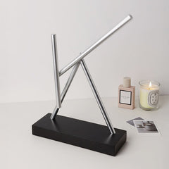 The Swinging Sticks Kinetic Energy Sculpture